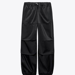 Satin black parachute pants